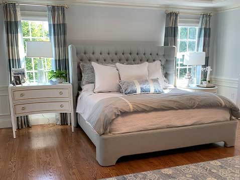 Bright colored bedroom with drapery